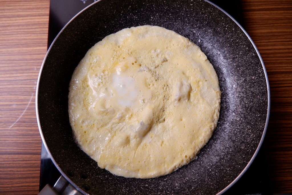 uncover the pan if the eggs are settled already