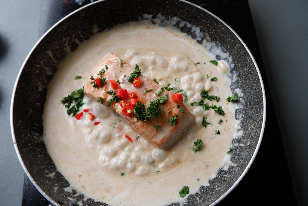 keto creamy coconut lemon salmon - simmer for a few minutes